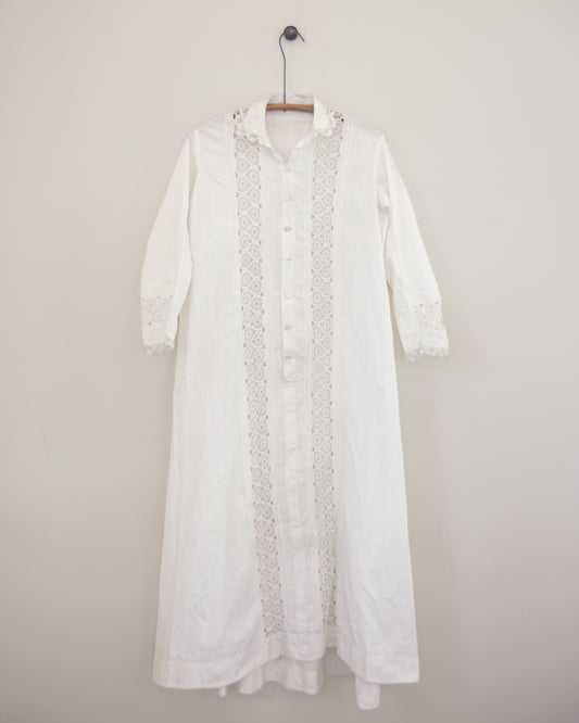 White dress with lace detailing on hanger