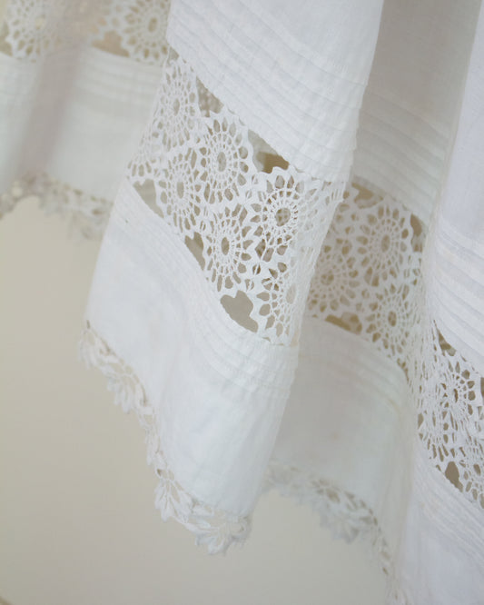 Lace detailing at hem of skirt