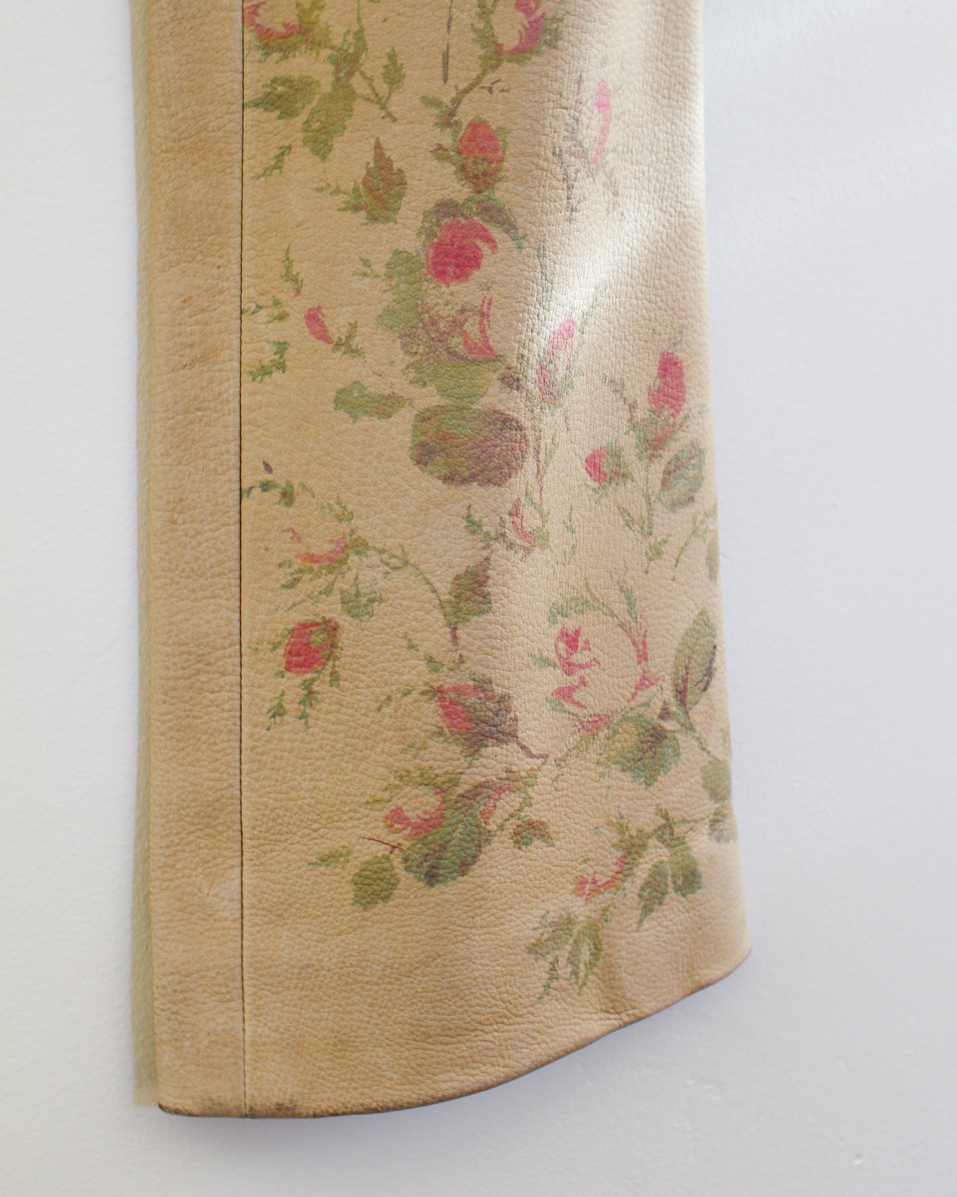 Floral patterned fabric on deerskin leather pants