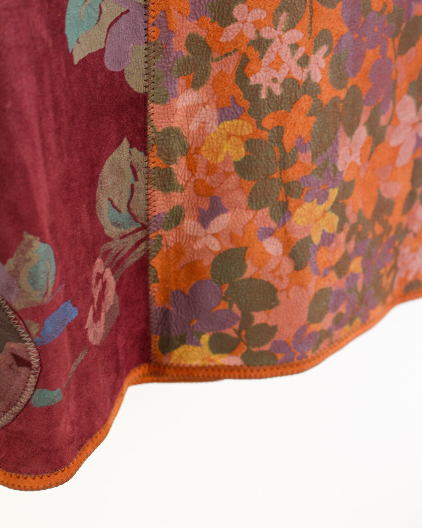 Close-up of a fabric with floral pattern on a white background