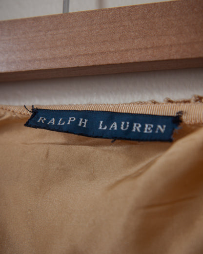 Ralph Lauren label on a brown fabric background