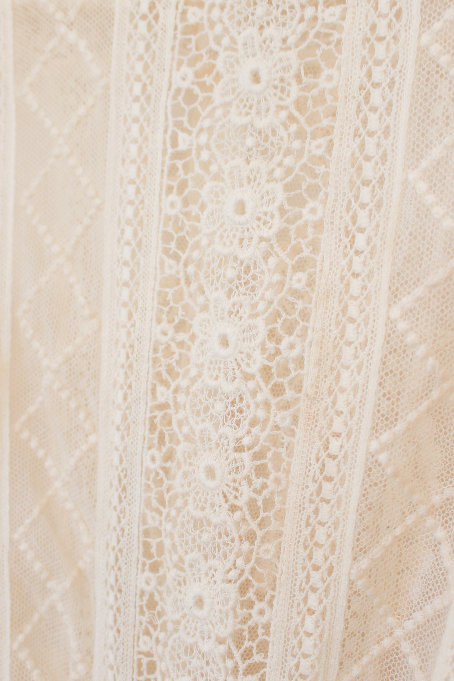 Close-up of textured beige and brown tiles with a subtle pattern.