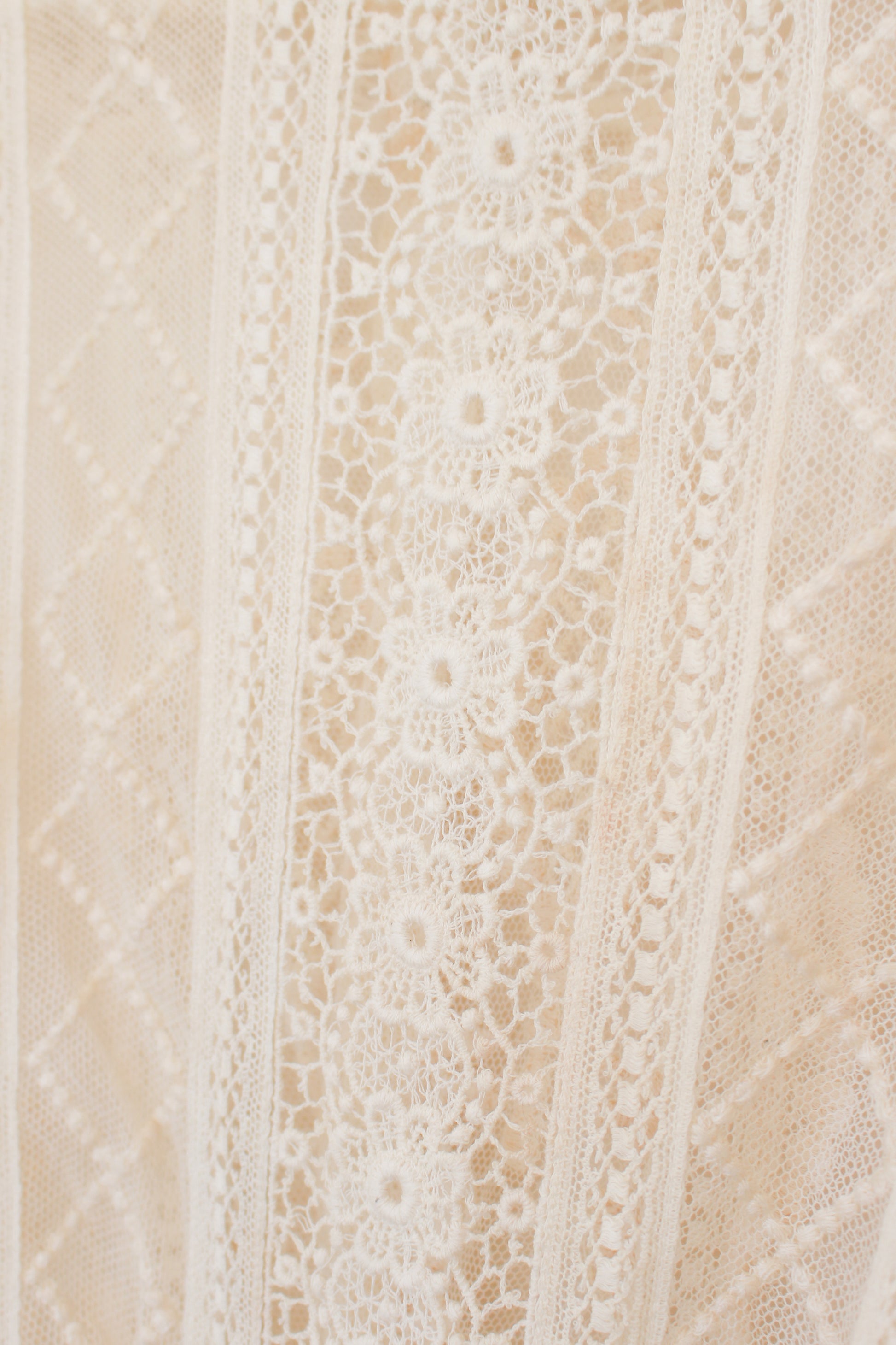 Close-up of textured beige and brown tiles with a subtle pattern.
