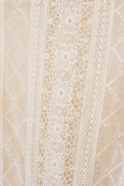 Close-up of textured beige and brown tiles with a subtle pattern.