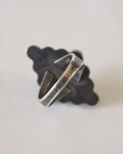 Silver ring on a white background