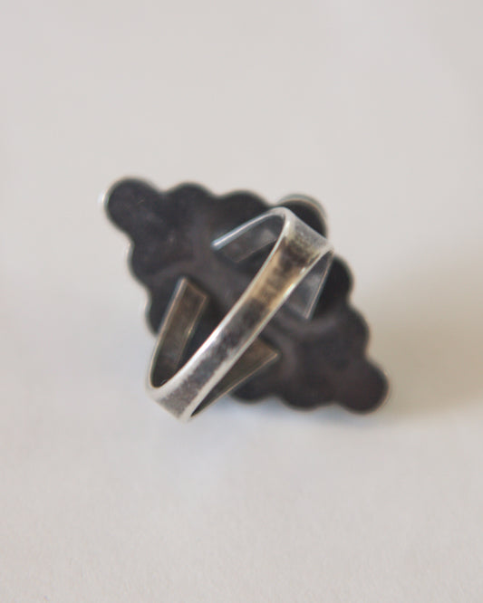 Silver ring on a white background