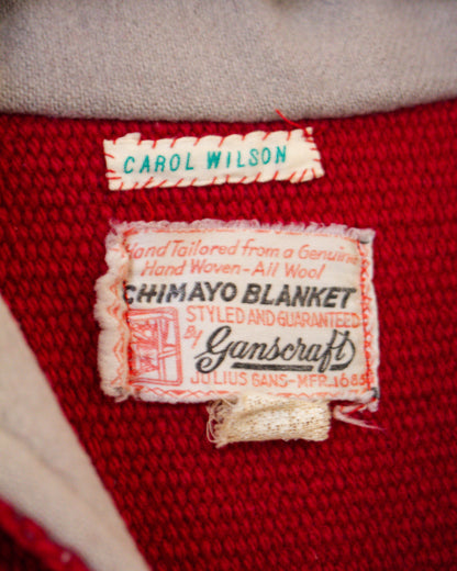 Label on a red jacket with 'Carol Wilson' and 'Ganscraft' branding.