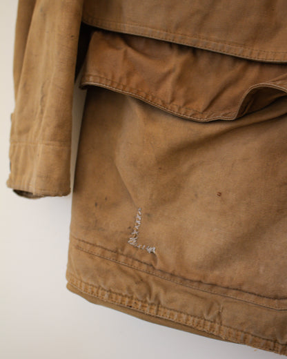 Brown jacket with visible wear on a white background