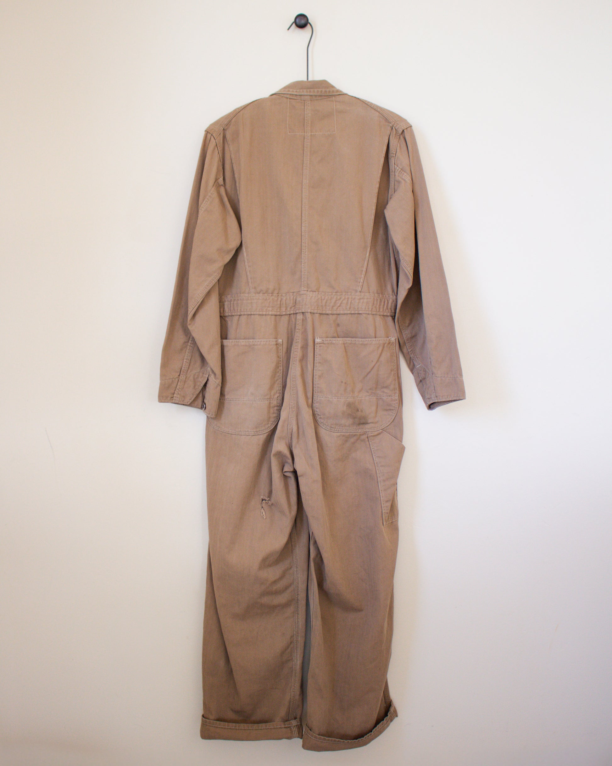 Brown coverall on a white background