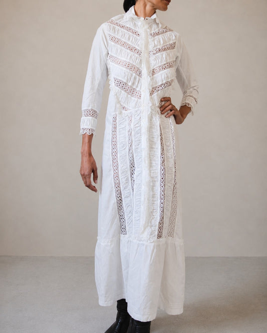 Woman wearing white nightgown.