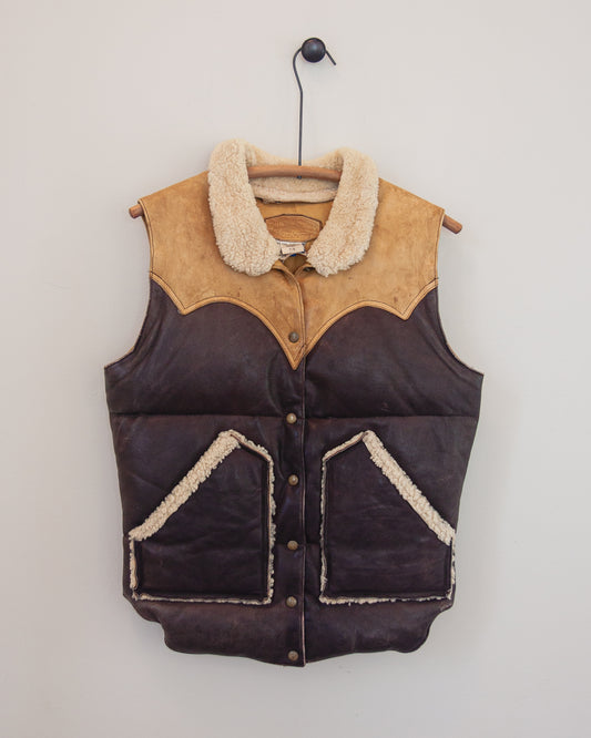 Down leather vest on a hanger