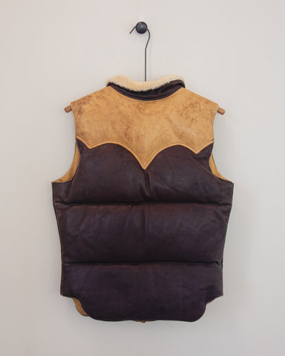 Back of down leather vest on a hanger