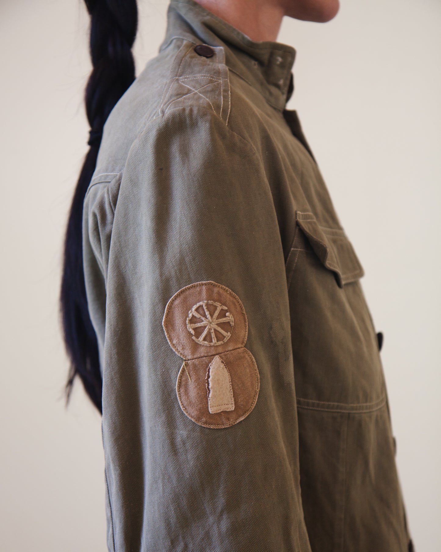 Patches on side of military jacket