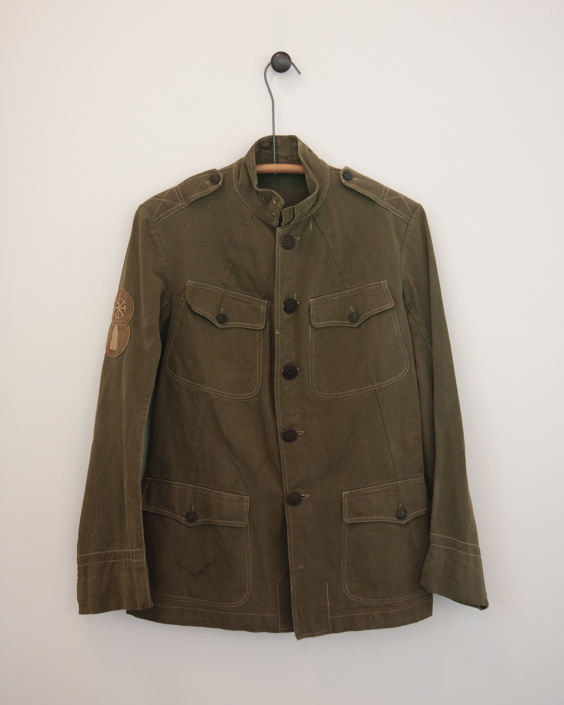 Military jacket on hanger