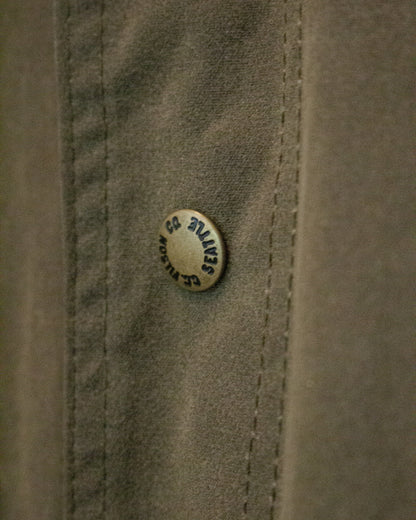 Close up of Filson Co Seattle button