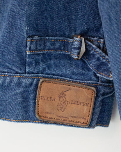Ralph Lauren label on denim jacket with buckle above it