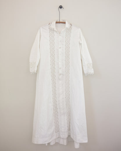 White dress with lace detailing on hanger