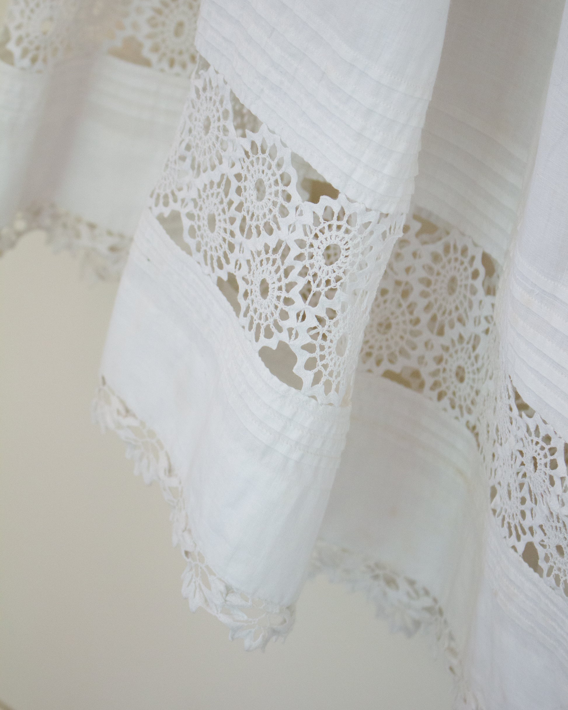Lace detailing at hem of skirt