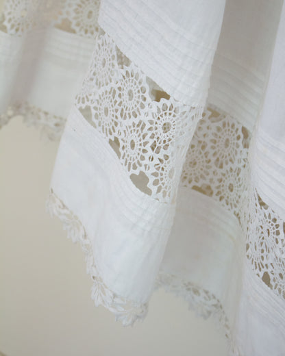 Lace detailing at hem of skirt