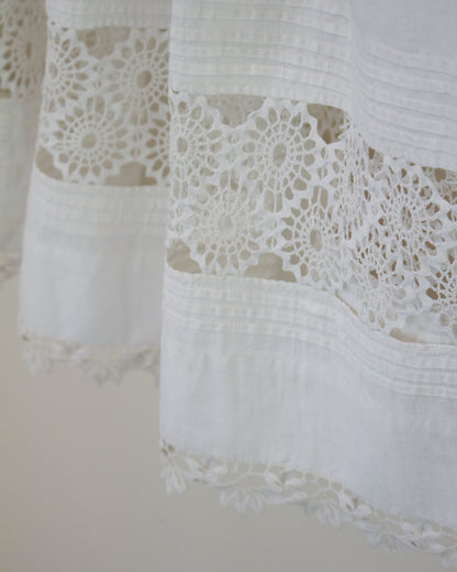 Lace detailing at hem of skirt