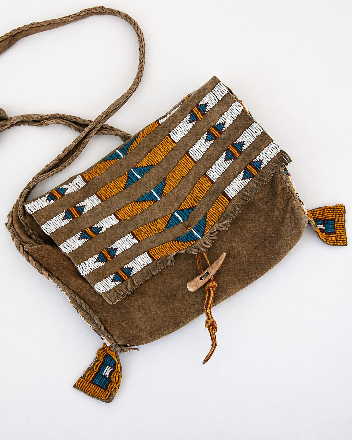 Beaded leather purse with bone toggle closure
