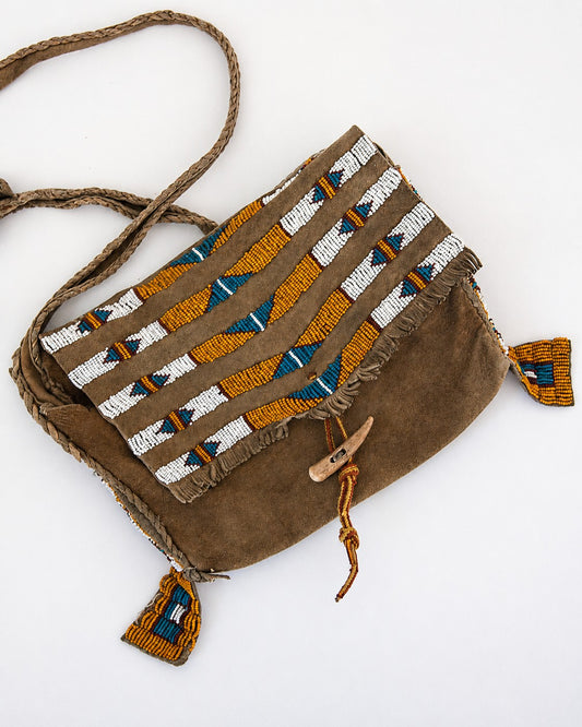 Beaded leather purse with bone toggle closure