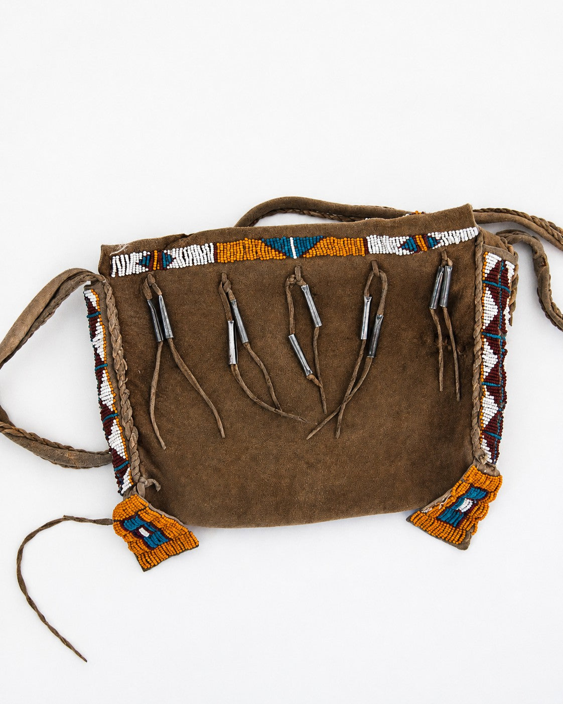 Back side of beaded leather purse with tassels down back