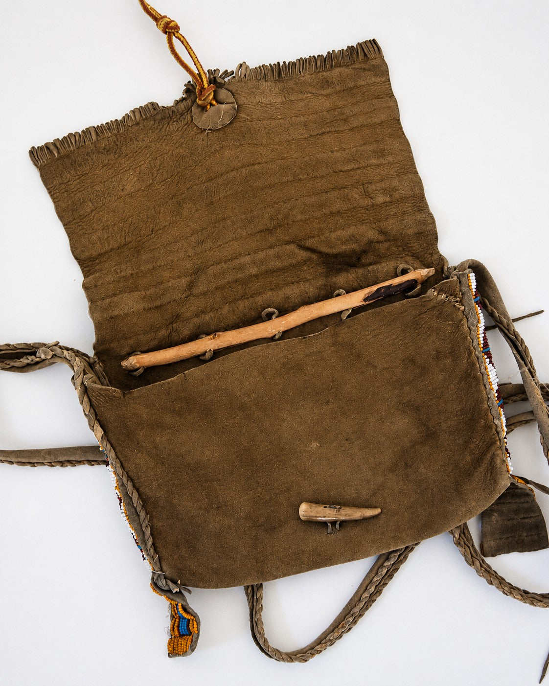 Inside flap of leather purse 