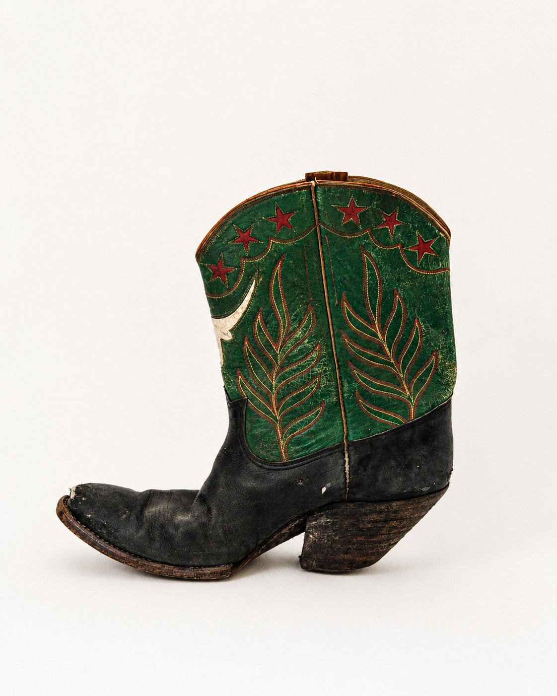 Black and green two-tone cowboy boots with longhorn and star inlay