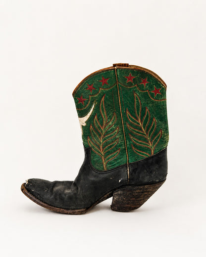 Black and green two-tone cowboy boots with longhorn and star inlay