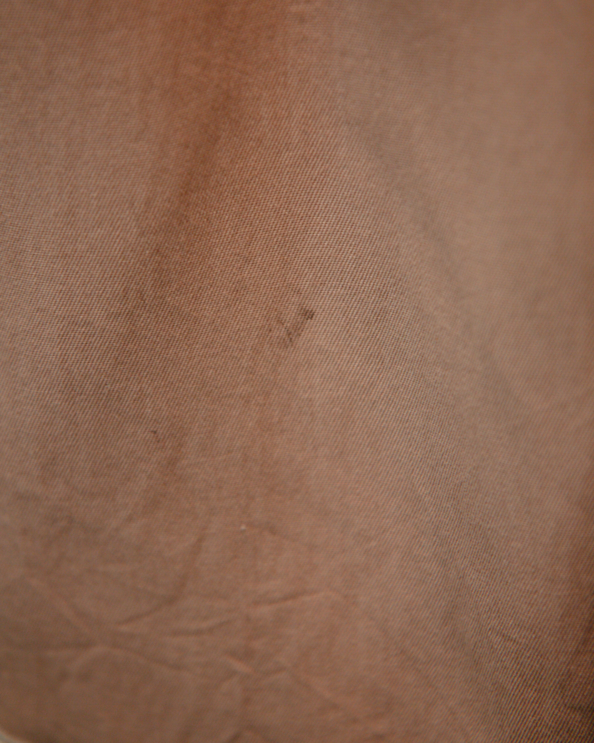 Close-up of brown fabric texture