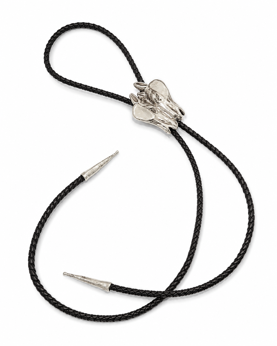 Bolo tie with silver clasp and black cord on a white background